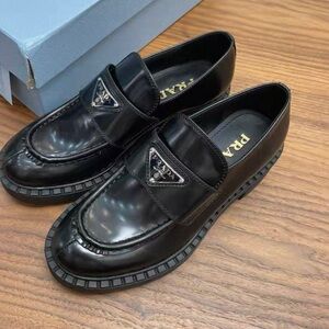 Prada Women's Glossy Black Loafers